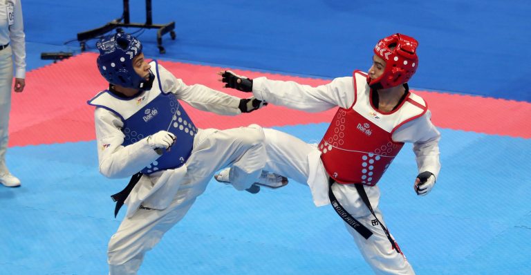 Cocha-2018-Taekwondo-58kg-Final-Chile-vs-Venezuela-B23I2541-Sebastian-Navea-e1530546223143